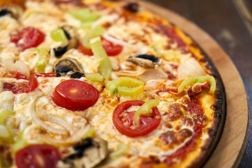 close up of pizza - pizza delivery in barbados