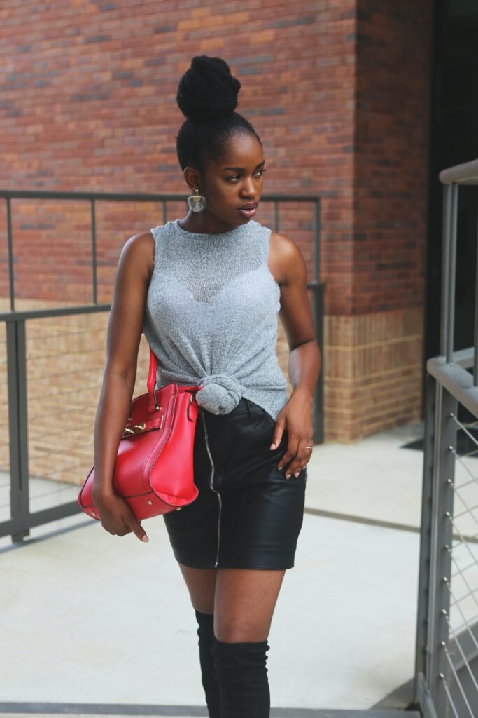 woman standing wearing miniskirt - summer fashion in barbados