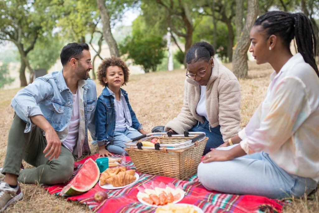 family having a picnic in the park - family activities in barbados