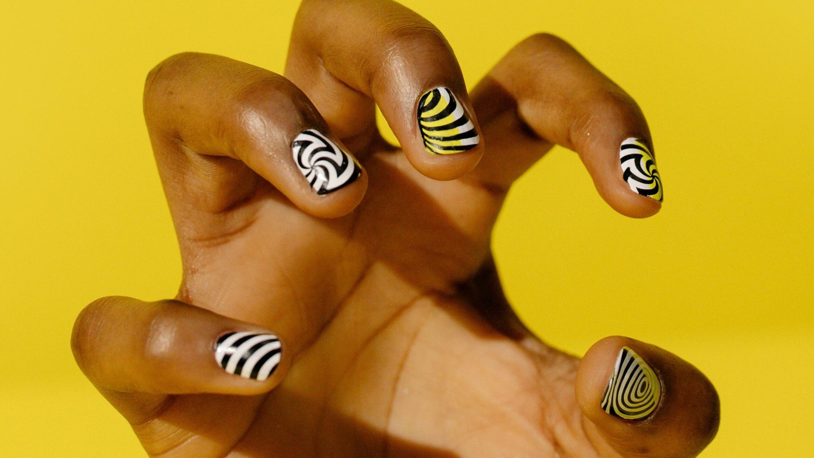 cluse up of graphic nail art nail techs in Barbados blog